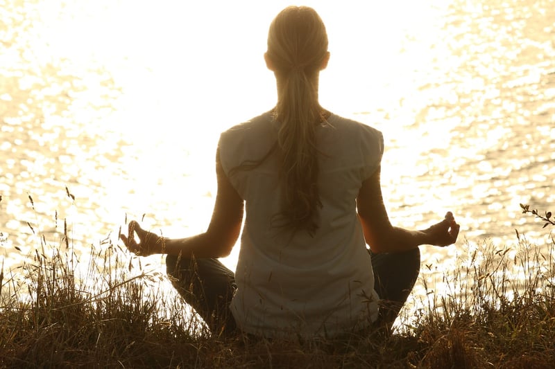Woman practicing deep breathing